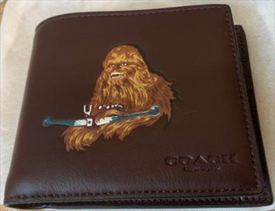 coach small zip around wallet price