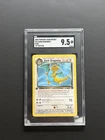 Dark Dragonite 22/82 Pokémon 2000 Team Rocket 1st Edition SGC 9.5 Mint+