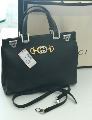 gucci zumi grainy leather medium top handle bolsa