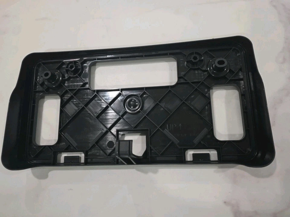 Soporte delantero para matrícula Toyota Camry SE XSE 2025-2027 75101-AQ020 OEM Foto 2 de 4
