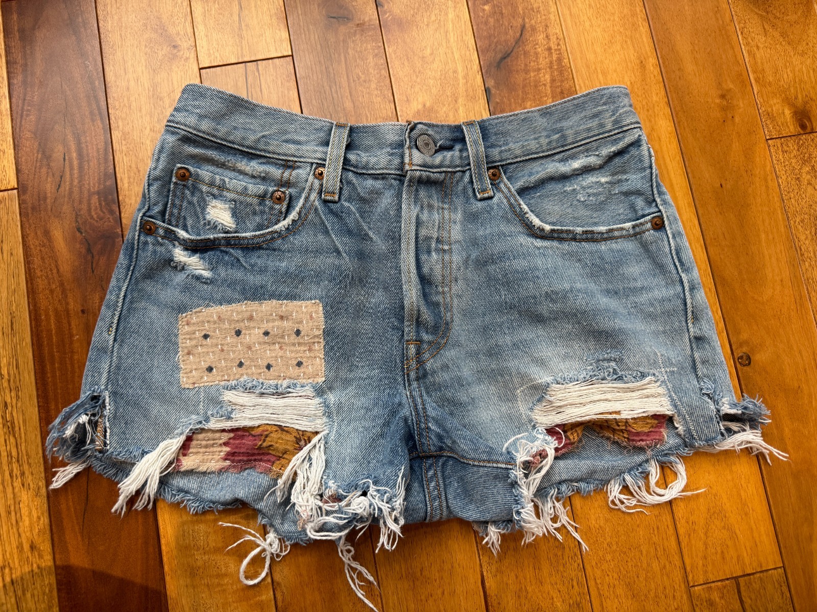 Levi's Women's 501 Distressed Patchwork Cutoff De… - image 1