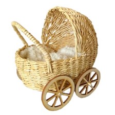 Miniature baby carriage, rattan look wicker doll stroller with wooden wheels. Mo
