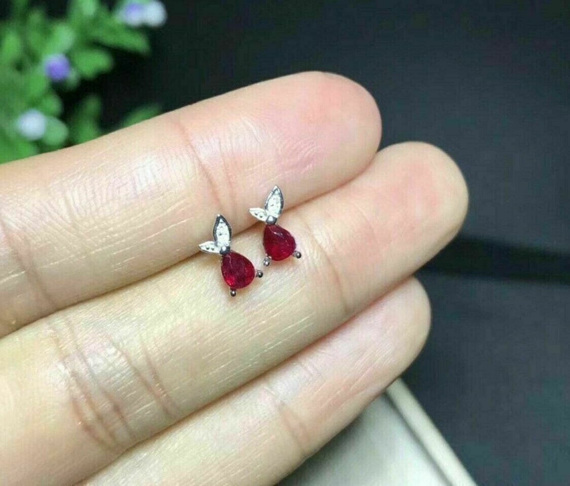 Pear Cut Simulated Red Ruby Elegant Fancy Stud Earrings in 14K White Gold Plating for a Sophisticated Look