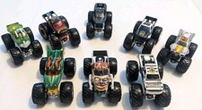 Lot of 8 Hot Wheels Monster Trucks Monster Jam 1:64 Scale Die Cast Vehicles