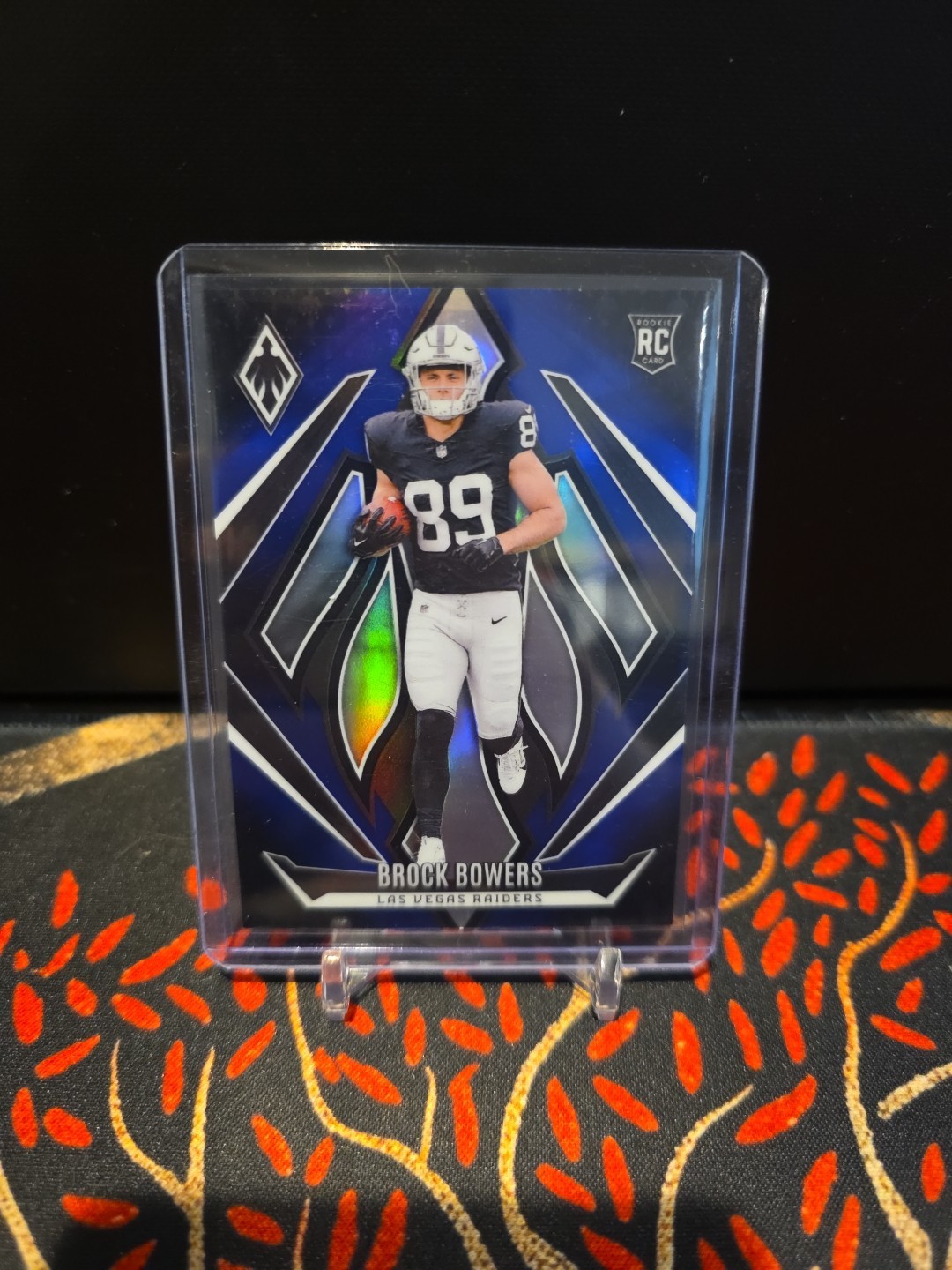 2024 Panini Phoenix #165 Brock Bowers Rookie Blue Fade 026/249 Raiders (RC) 