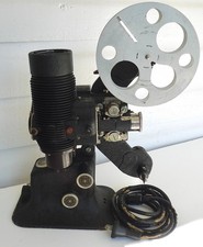 Vintage Bell Howell Filmo 57 16mm movie projector runs brittle cord p/r