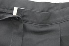 Black Jantzen women’s pants with front button closure, pleated detailing, and white size 12 tag on waistband.