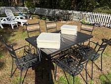M & S Black Metal 7 Piece Patio Table & 6 Chairs Set, Beige Cushions.