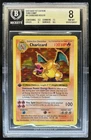 1999 Pokemon 1st Edition Charizard Shadowless Thin Stamp Holo #4/102 BGS 8