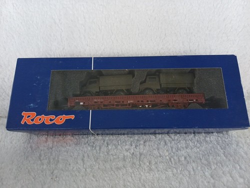 Roco Spur HO 67764 DB AG Drehgestell-Rungenwagen mit zwei Unimog-Ladungen 926-6 | Zustand: Used