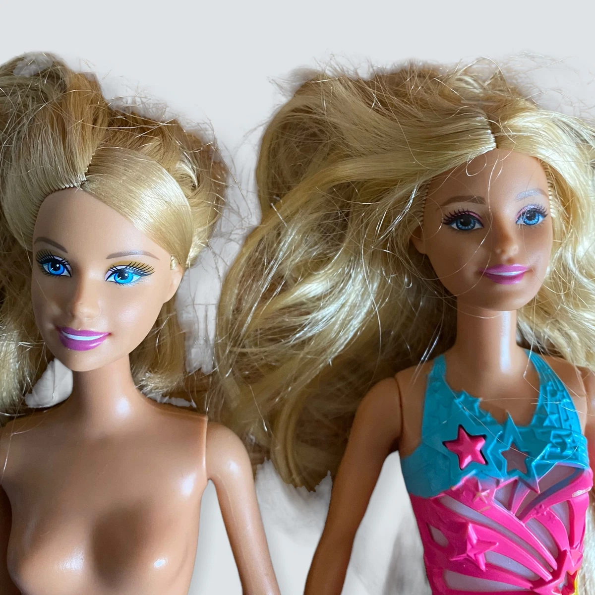2 barbie on sale dolls