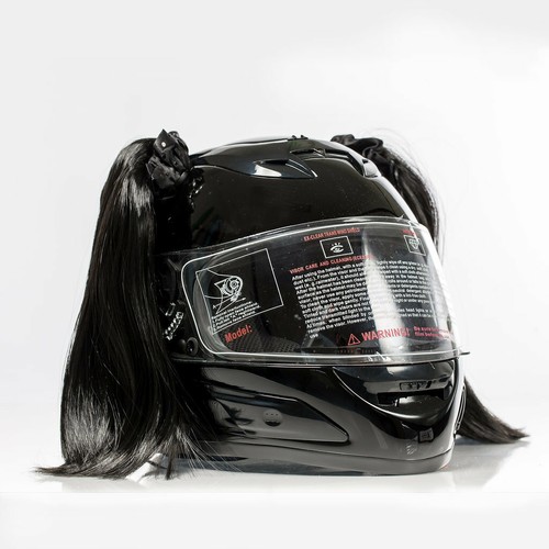 motorcycle helmet with pink pigtails