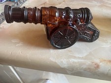 Avon aftershave bottle in the shape of a cannon.