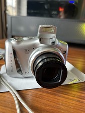 Canon PowerShot SX150 IS Digital Compact Camera Working w/ 12x IS Zoom Lens