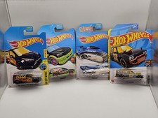 Hot Wheels Lot Of 4 Regular Treasure Hunts