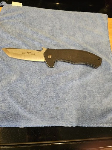 Emerson knivestanto  Roadhouse SF Satin finish 2011 model with solid backspacer 