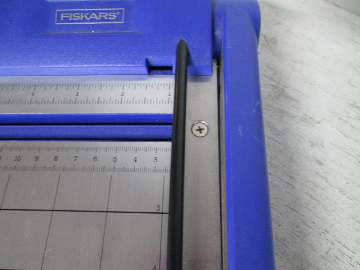Fiskars paper cutter ruler and measurement markings close up