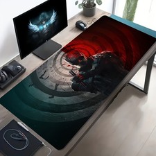 A Large Electronic Sports Gaming Mouse Pad Featuring a Silhouette of a Stick Fi