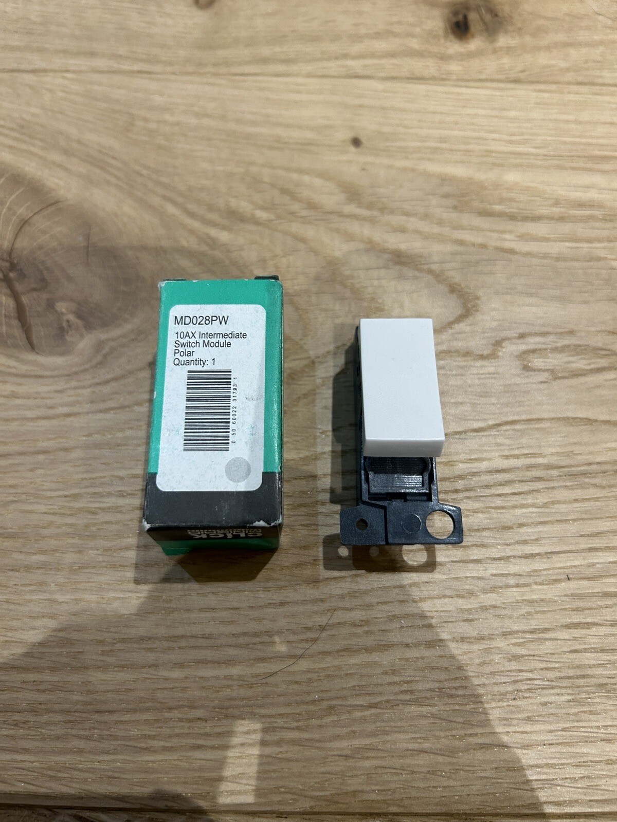 Click Minigrid MD028PW 10AX Intermediate Switch Module Polar White Grid Light