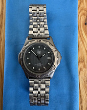 GM Herren Armbanduhr Titan Analog 10 ATM Datumsanzeige grau/schwarz 1651