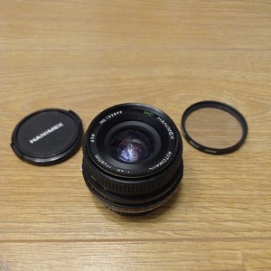 Hanimex 28mm f2.8 Prime Wide Angle Lens. olympus Bayonet Mount fungus Sold asis