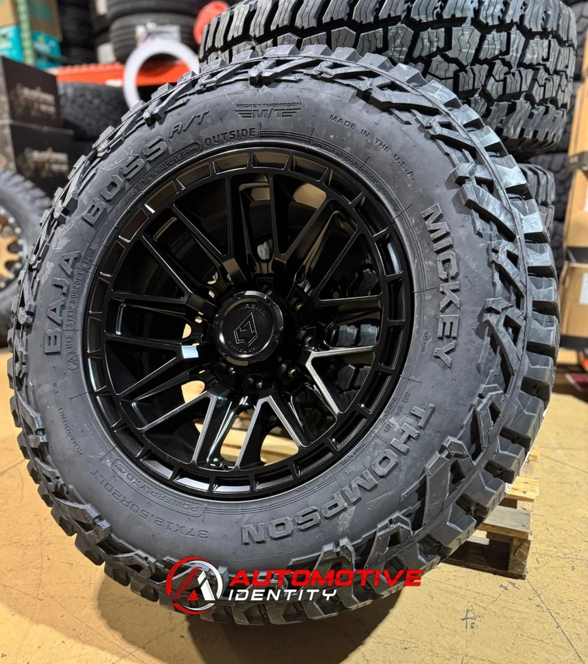 Ruedas negras Arena Battle 20x10 neumáticos Baja AT 37" 6x135 Ford F150 Raptor SVT Foto 2 de 4