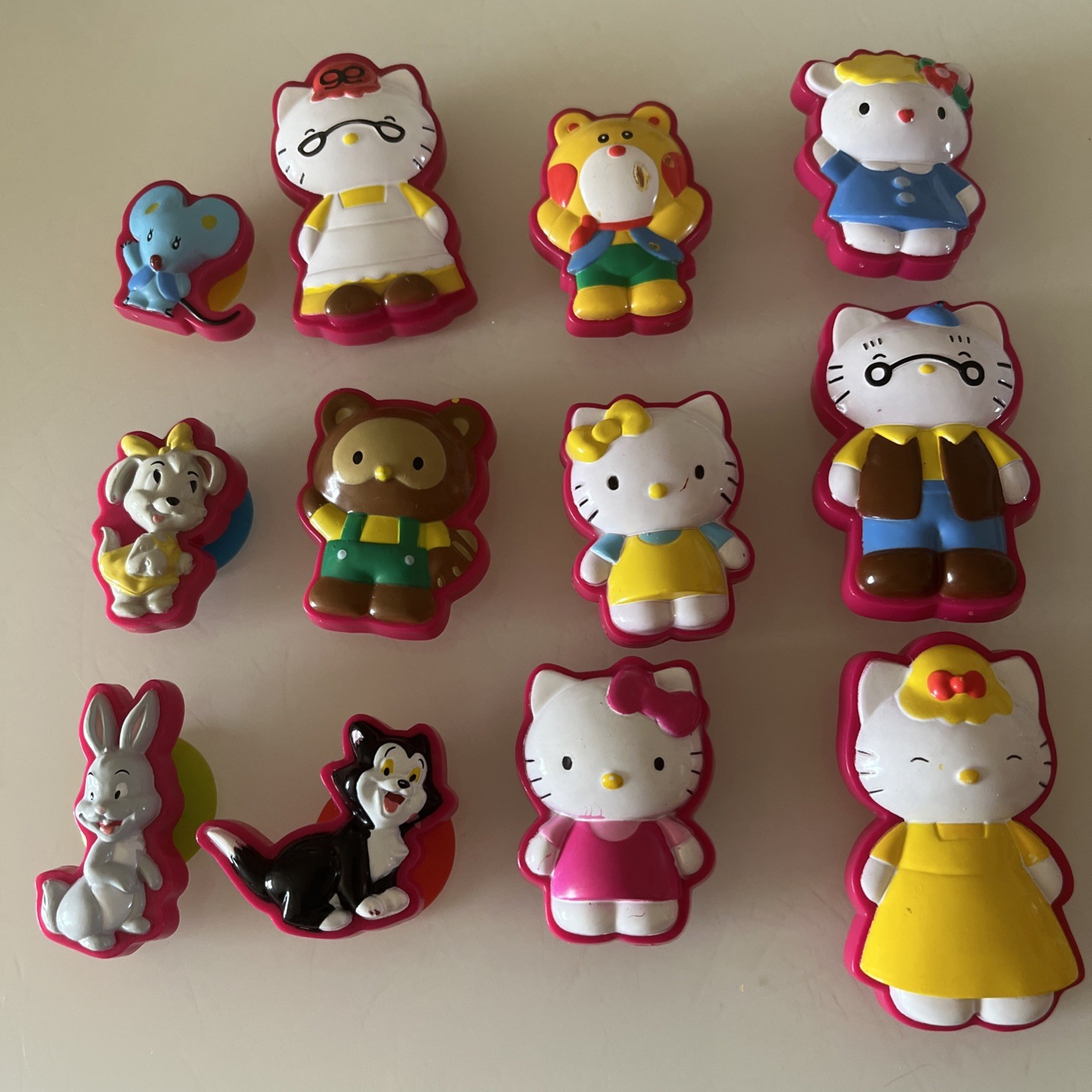 Hello Kitty Stuck on Stories 12 Suction Cup Characters by Sanrio. Cake Toppers?