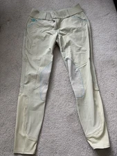 30L Piper evolution, tan with electric blue, knee patch. Excellent condition 