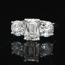 2.90ct Emerald and Round Brilliant Cut H VS2 Diamond Three Stone Ring GIA