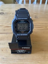 Image of Casio G-Shock DW-5600E-1V New in box with Tags & Papers