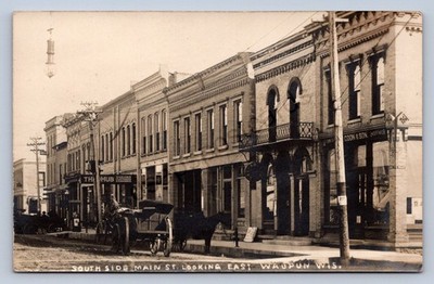 J90/ Waupun Wisconsin RPPC Postcard c1910 Main Street Stores Undertaker 133