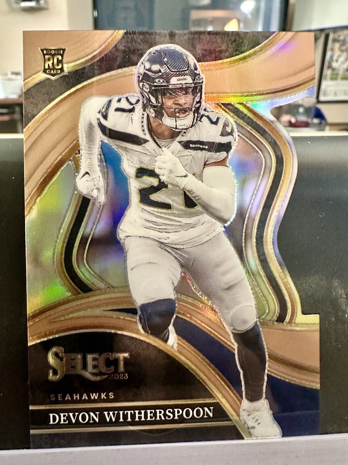 2023 Select Prizm Copper Die Cut 273 - Devon Witherspoon /299 - Seattle Seahawks