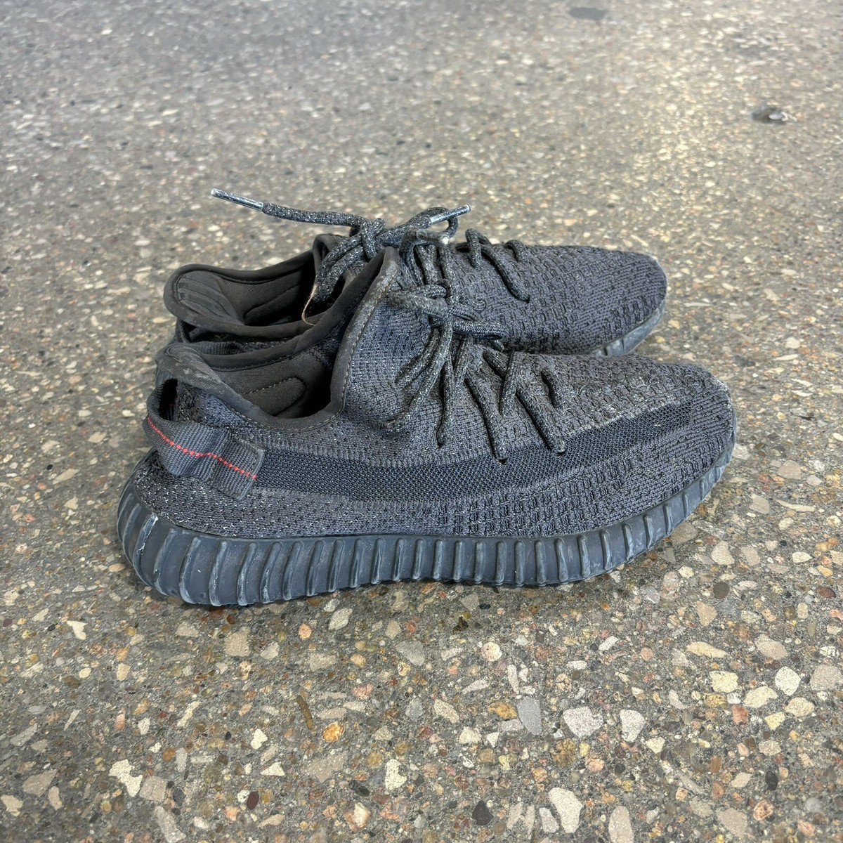 yeezy black reflective on feet