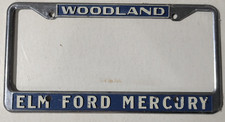 VTG Metal Woodland CA Elm Ford Mercury Embossed Dealership License Plate Frame