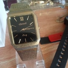 vintage Ingersoll men's quartz wristwatch with a rectangular, gold-toned case