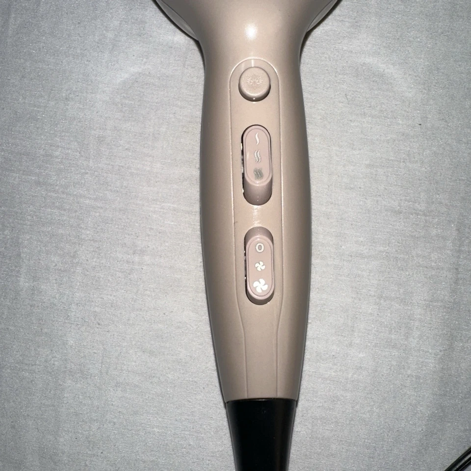 Secador de pelo Remington Pro Wet 2 estilos oro rosa tecnología iónica compacta Foto 4 de 4