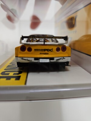 NISSAN SKYLINE イエロー 1/43 ミニカー NISSAN SKYLINE GT-R (BNR34) NISMO S-tune ライトニング
