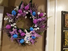 20 inch primative wreath with lavender and blue Easter eggs, florals and a bunny