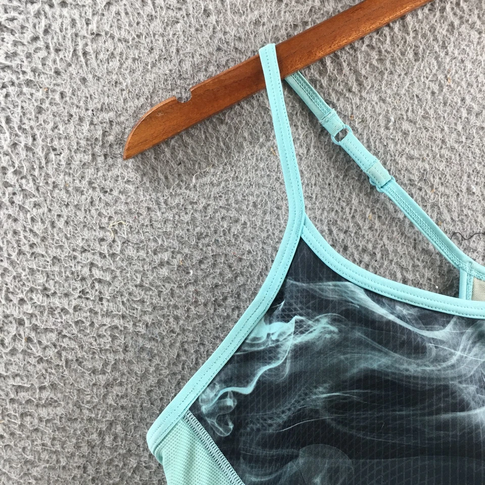 Sujetador deportivo New Balance para mujer L verde azulado negro pulóver sin mangas informal cómodo Foto 3 de 4