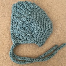 Handmade newborn baby bonnet with chin ties designed by JadeRoseCrochet