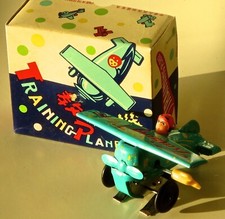 Rare Tin Litho Windup Training Plane Toy. New in Pkg. Flips Over. China 1990.