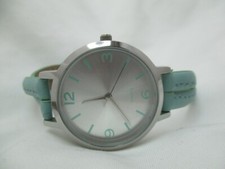 Analog Wristwatch Blue Buckle Band Round Silver Tone Face