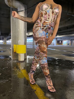 Variety of NEW womens clothing with tags, different sizes, different styles.