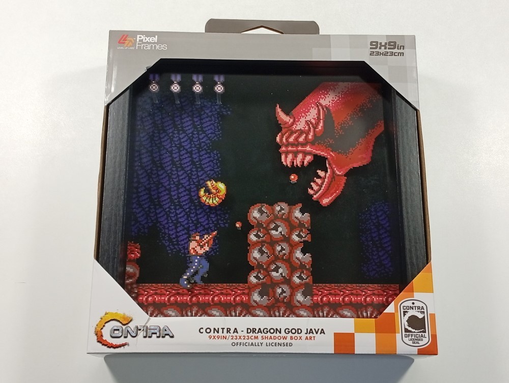 Diorama pixel art Contra Konami pour décoration de salon geek moderne