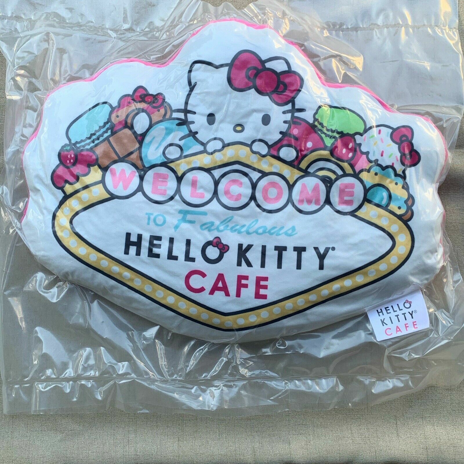 Hello Kitty Cafe Las Vegas Throw Pillow (White)