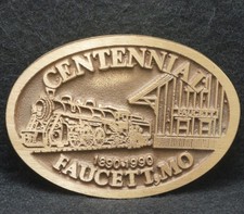 XC13135 NOS VINTAGE 1990 FAUCETT, MO. CENTENNIAL COMMEMORATIVE BELT BUCKLE