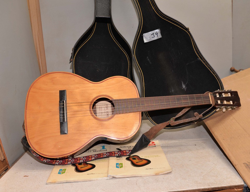 Folk Lore model T695 acoustic guitar & case collectible musical