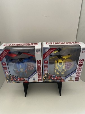 TWO, World Tech Toys: Transformer Bumblebee/ Optimus Prime. Helicopters NEW Set2