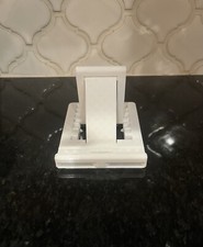 3D printed Adjustable Phone Stands.  Colors: Black, White And Glow in the Dark 
