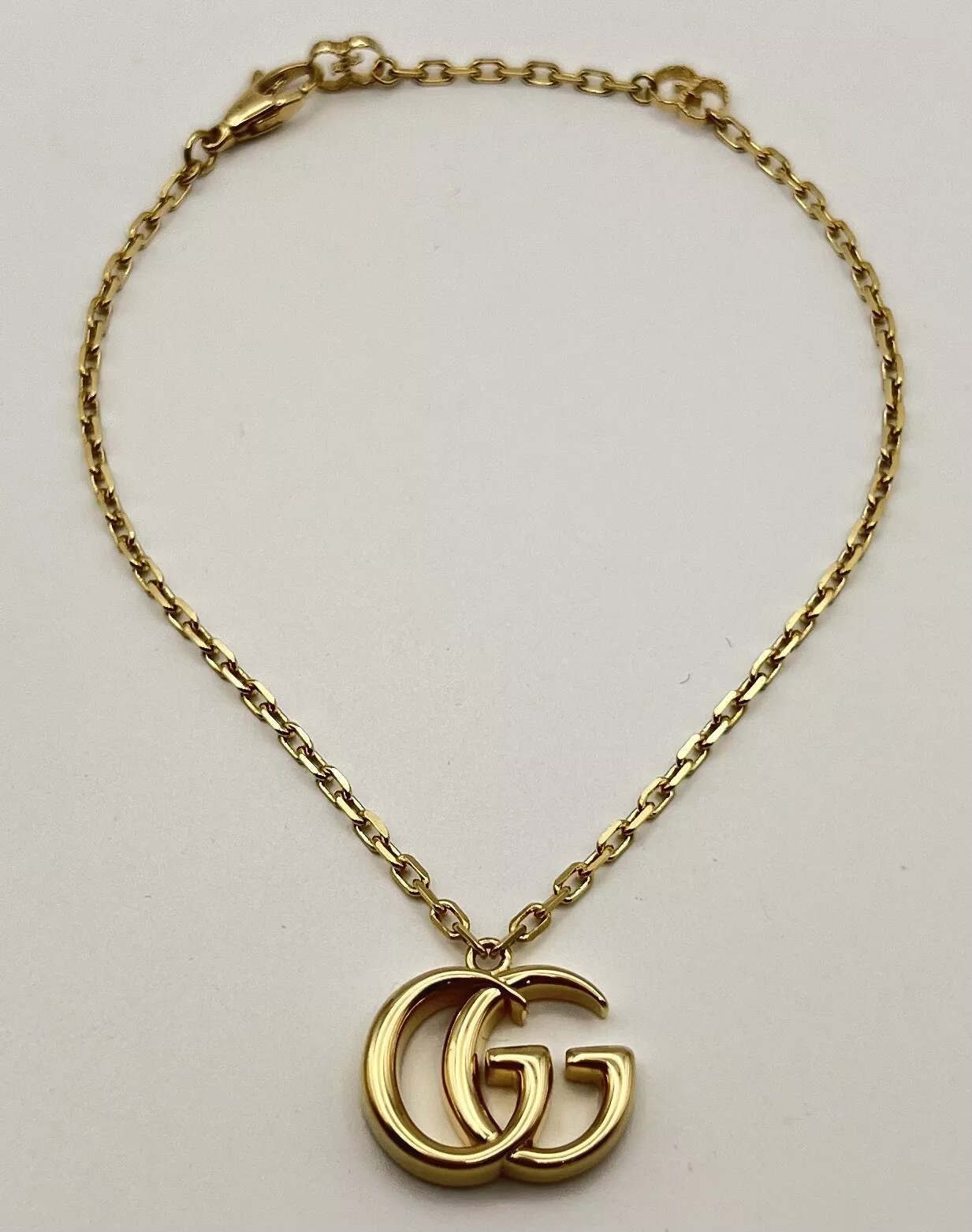 Bracelet Gucci double logo G or jaune 18 carats   bijoux fins